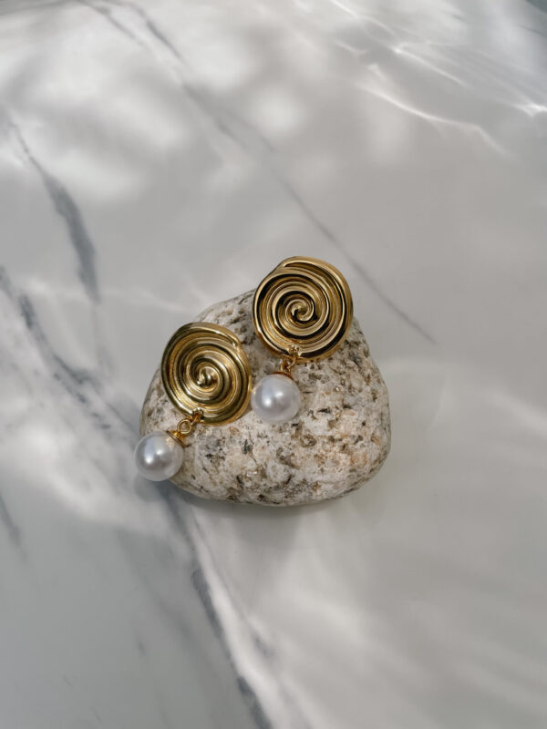 Arete caracol con perlita